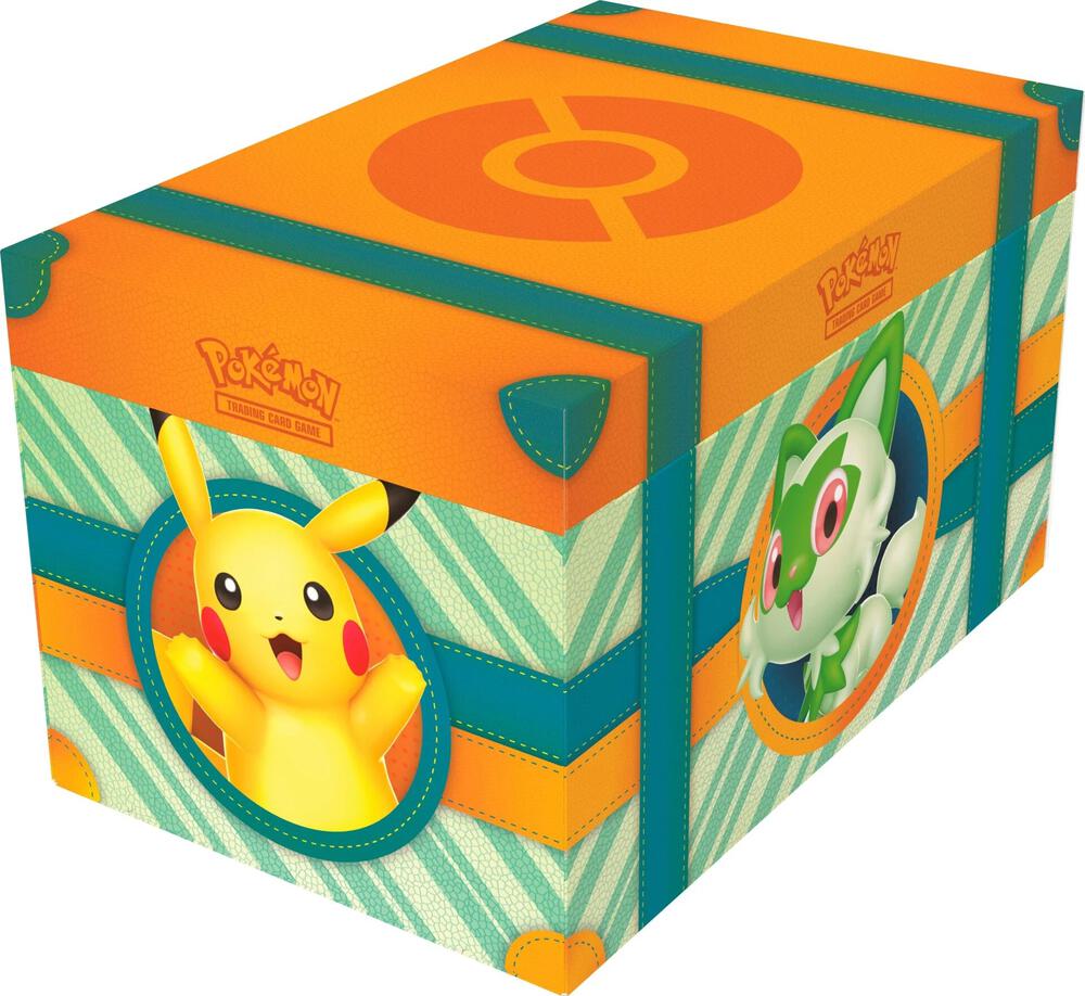 Sealed Paldea Adventure Chest featuring Sprigatito, Fuecoco, and Quaxly artwork, showcasing the Pikachu squishy toy and various foil promo cards.